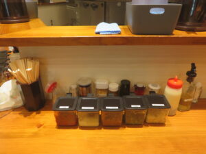 ネギラーメン（普通）@ラーメンショップ◯化 池袋店（池袋駅）卓上